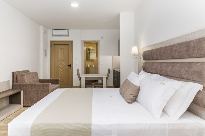 Imagen de la habitación del Hotel Aria Garden Suites. Foto 11