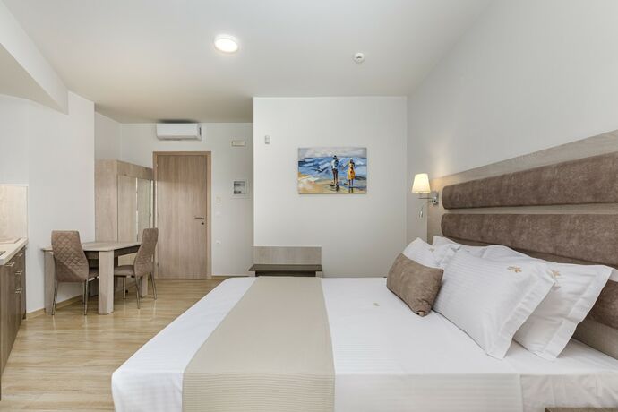 Imagen de la habitación del Hotel Aria Garden Suites. Foto 13