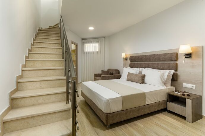 Imagen de la habitación del Hotel Aria Garden Suites. Foto 14