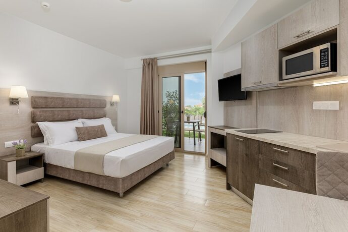 Imagen de la habitación del Hotel Aria Garden Suites. Foto 18