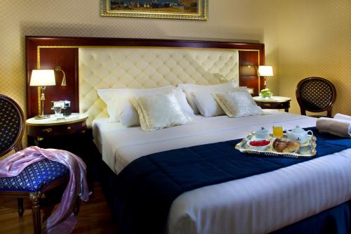 Imagen de la habitación del Hotel Aria Palace by OMNIA hotels. Foto 4