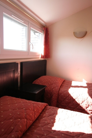 Imagen de la habitación del Hotel Ariane, Pontorson. Foto 10