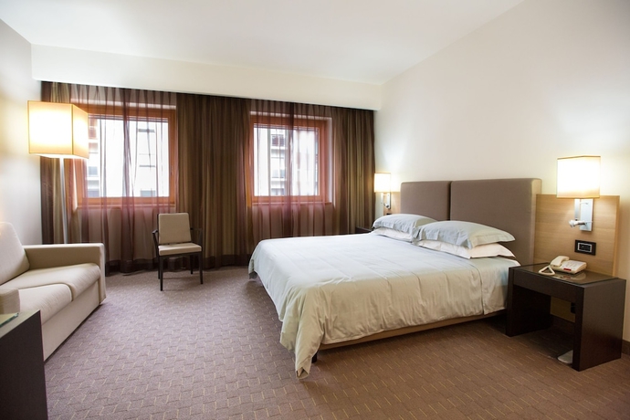 Imagen de la habitación del Hotel Ariha Cosenza. Foto 6