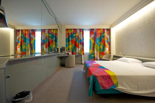 Imagen de la habitación del Hotel Ariha, Quattromiglia. Foto 4