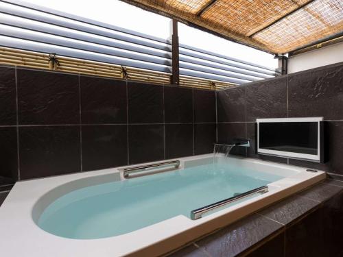 Imagen de la habitación del Hotel Arima Royal. Foto 6
