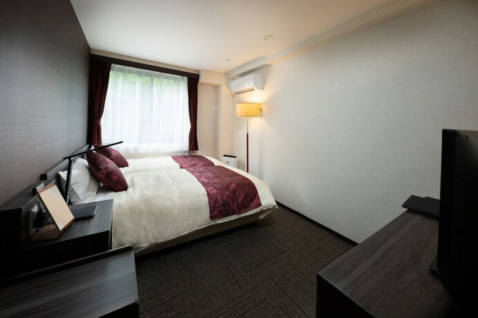 Imagen de la habitación del Hotel Arima onsen Koki. Foto 17
