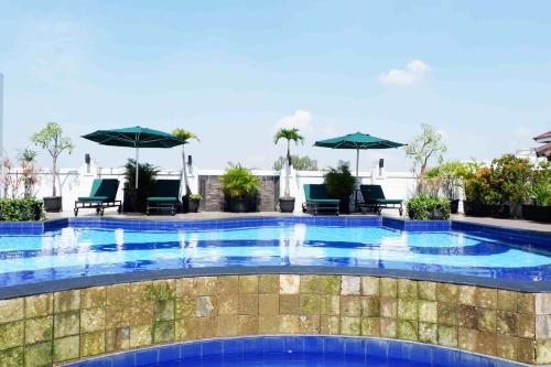 Imagen de la piscina del Hotel Arion Swiss-belhotel Bandung - Chse Certified. Foto 11