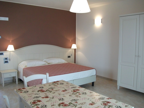 Imagen de la habitación del Hotel Ariotto Village. Foto 9