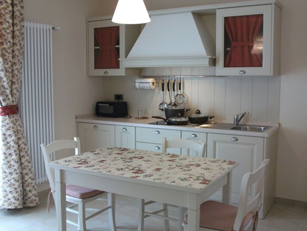 Imagen de la habitación del Hotel Ariotto Village. Foto 10