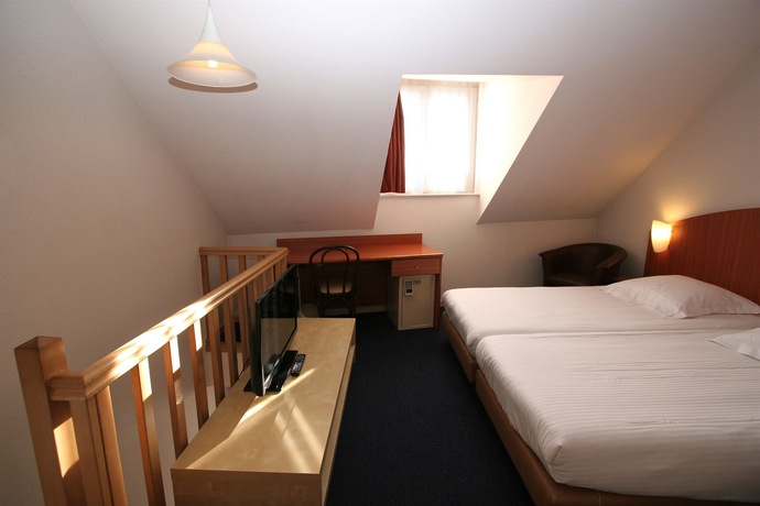 Imagen de la habitación del Hotel Aris Grand-place. Foto 8