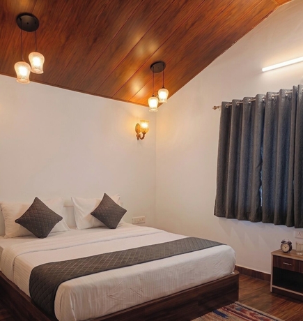 Imagen de la habitación del Hotel Arise Rustic Village Resort. Foto 2