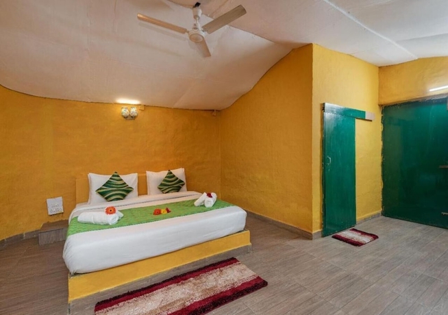 Imagen de la habitación del Hotel Arise Rustic Village Resort. Foto 8