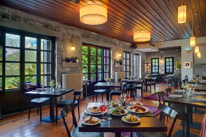 Imagen del bar/restaurante del Hotel Aristi Mountain Resort and Villas. Foto 2
