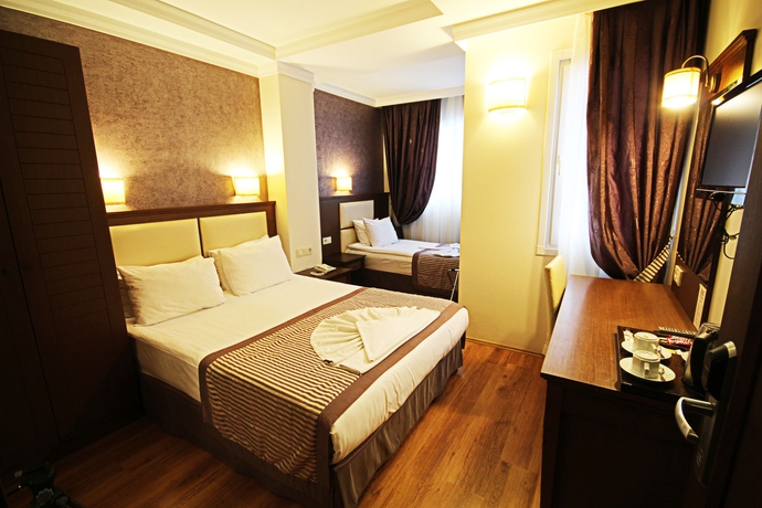 Imagen de la habitación del Hotel Aristocrat. Foto 8