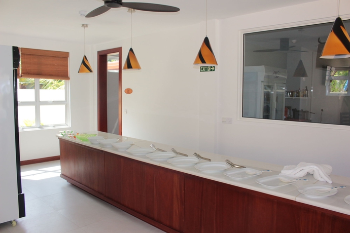 Imagen del bar/restaurante del Hotel Ariston Dhangethi Inn. Foto 4