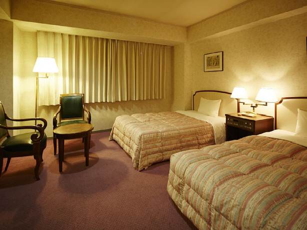 Imagen de la habitación del Hotel Ariston Kobe. Foto 16