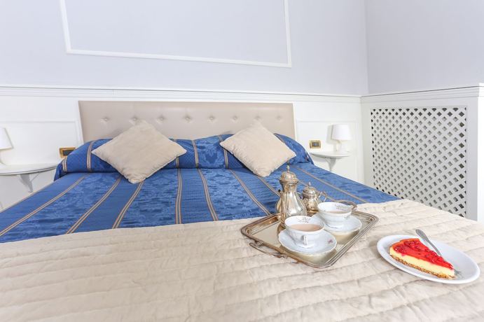 Imagen de la habitación del Hotel Ariston, Livorno. Foto 15