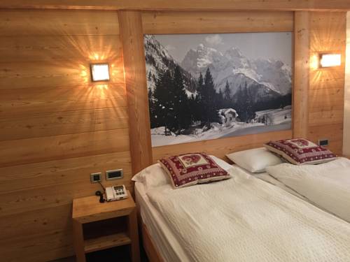 Imagen de la habitación del Hotel Ariston, Madonna di Campiglio. Foto 1