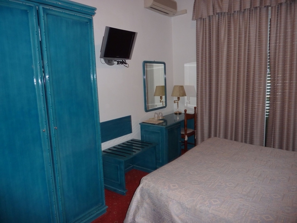 Imagen de la habitación del Hotel Ariston Montecarlo. Foto 12