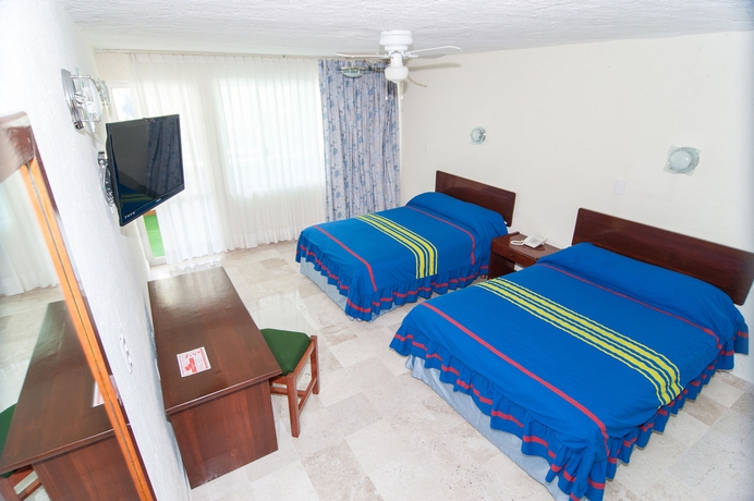 Imagen de la habitación del Hotel Aristos Cuernavaca. Foto 7