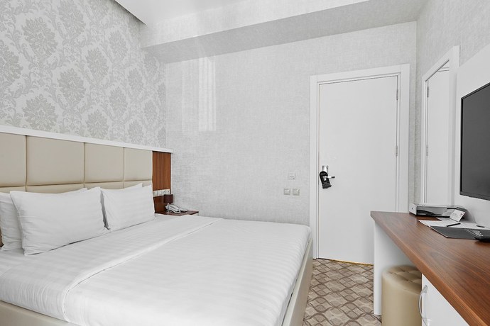 Imagen de la habitación del Hotel Arium. Foto 15