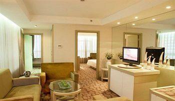 Imagen de la habitación del Hotel Ariva, Qingdao. Foto 4