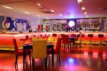 Imagen del bar/restaurante del Hotel Ariva, Qingdao. Foto 2