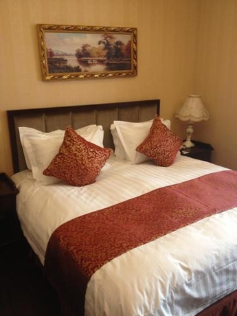 Imagen de la habitación del Hotel Ariva Tianjin Binhai Serviced Apartment. Foto 8