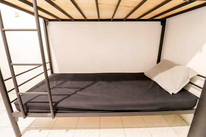Imagen de la habitación del Hotel Arjuna 31 Homestay - Hostel. Foto 16