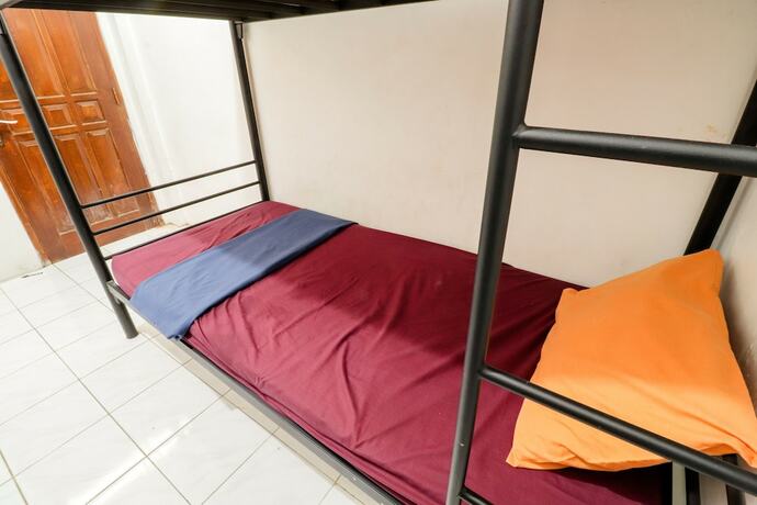 Imagen de la habitación del Hotel Arjuna 31 Homestay - Hostel. Foto 17