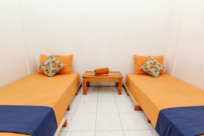 Imagen de la habitación del Hotel Arjuna 31 Homestay - Hostel. Foto 19
