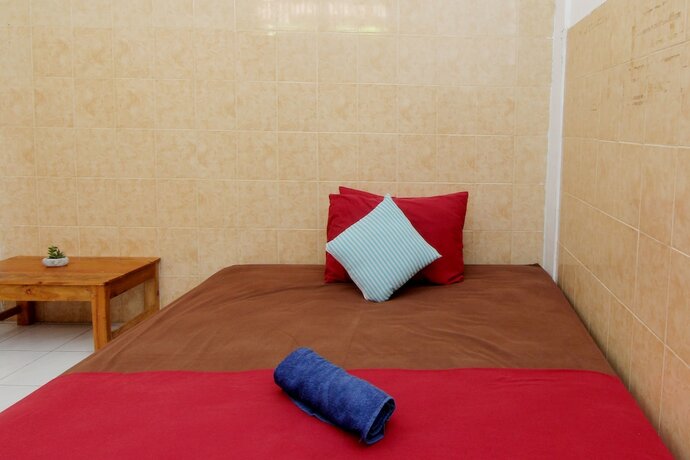 Imagen de la habitación del Hotel Arjuna 31 Homestay - Hostel. Foto 20