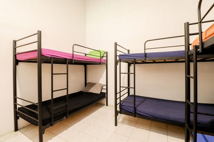 Imagen de la habitación del Hotel Arjuna 31 Homestay - Hostel. Foto 23