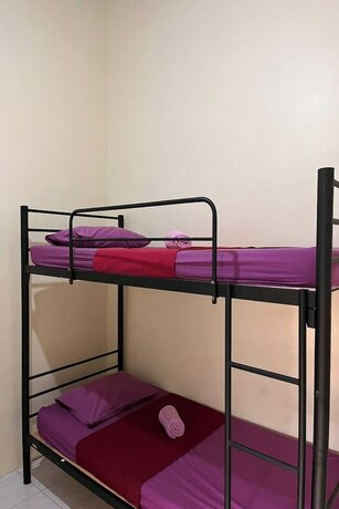 Imagen de la habitación del Hotel Arjuna 31 Homestay - Hostel. Foto 25