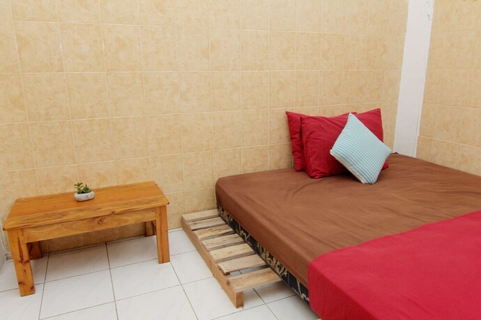 Imagen de la habitación del Hotel Arjuna 31 Homestay - Hostel. Foto 29