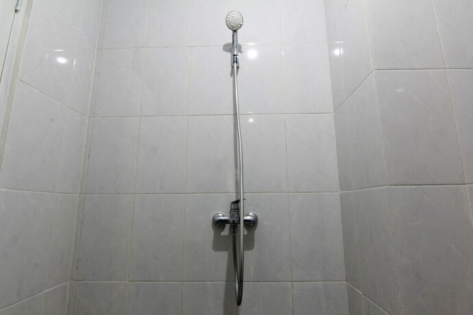 Imagen de la habitación del Hotel Arjuna 31 Homestay - Hostel. Foto 30
