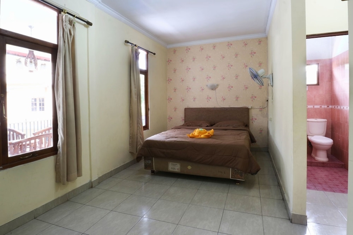 Imagen de la habitación del Hotel Arjuna, Bogor. Foto 8