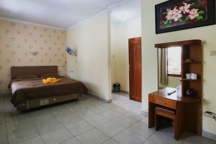 Imagen de la habitación del Hotel Arjuna, Bogor. Foto 9