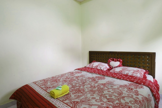 Imagen de la habitación del Hotel Arjuna, Bogor. Foto 12