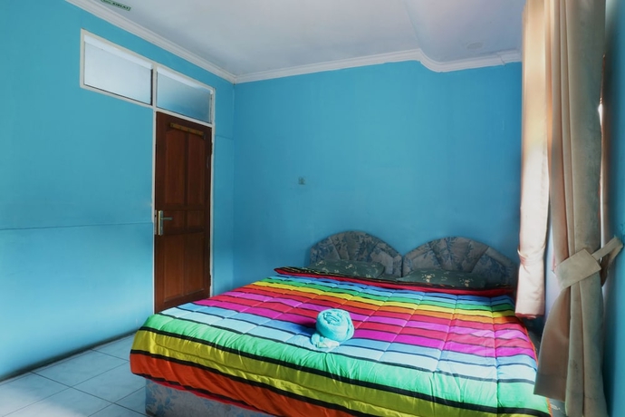 Imagen de la habitación del Hotel Arjuna, Bogor. Foto 14