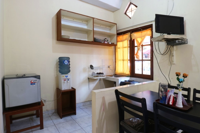 Imagen de la habitación del Hotel Arjuna, Bogor. Foto 17