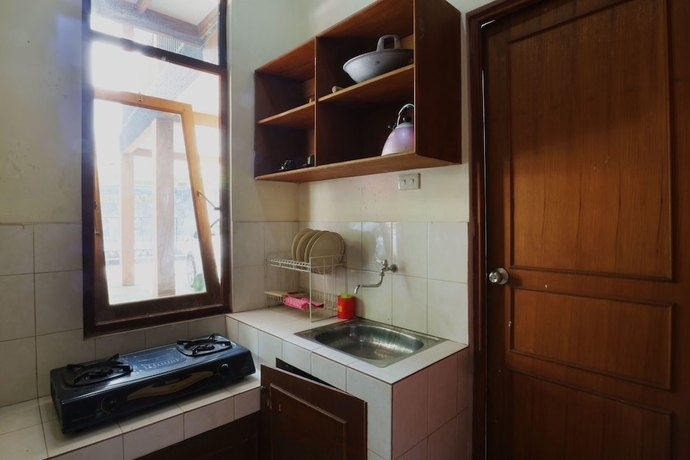 Imagen de la habitación del Hotel Arjuna, Bogor. Foto 18