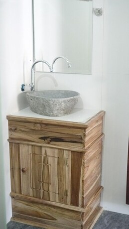 Imagen de la habitación del Hotel Arjuna Bungalow. Foto 22