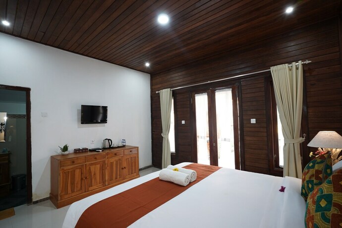 Imagen de la habitación del Hotel Arjuna Bungalow. Foto 28