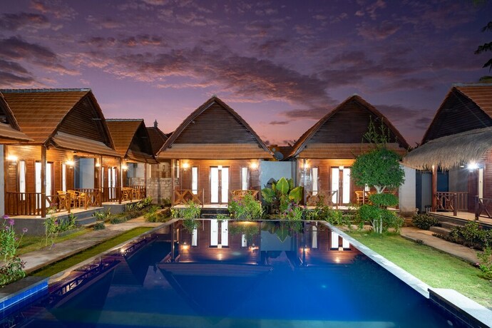 Imagen de la piscina del Hotel Arjuna Bungalow. Foto 39