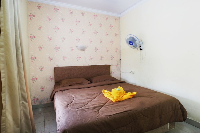 Imagen de la habitación del Hotel Arjuna. Foto 13