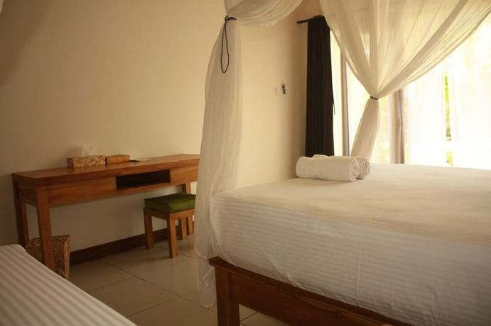 Imagen de la habitación del Hotel Arjuna Homestay. Foto 7