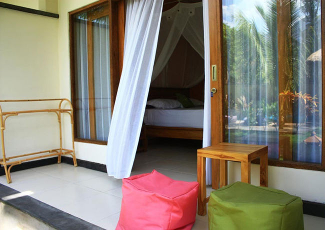 Imagen de la habitación del Hotel Arjuna Homestay. Foto 10