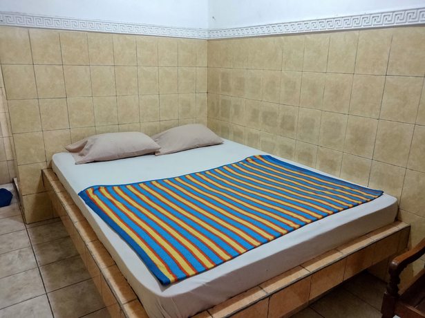 Imagen de la habitación del Hotel Arjuna Sari Bandungan. Foto 18