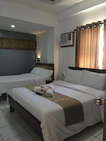 Imagen de la habitación del Hotel Ark Bayz Suites. Foto 6